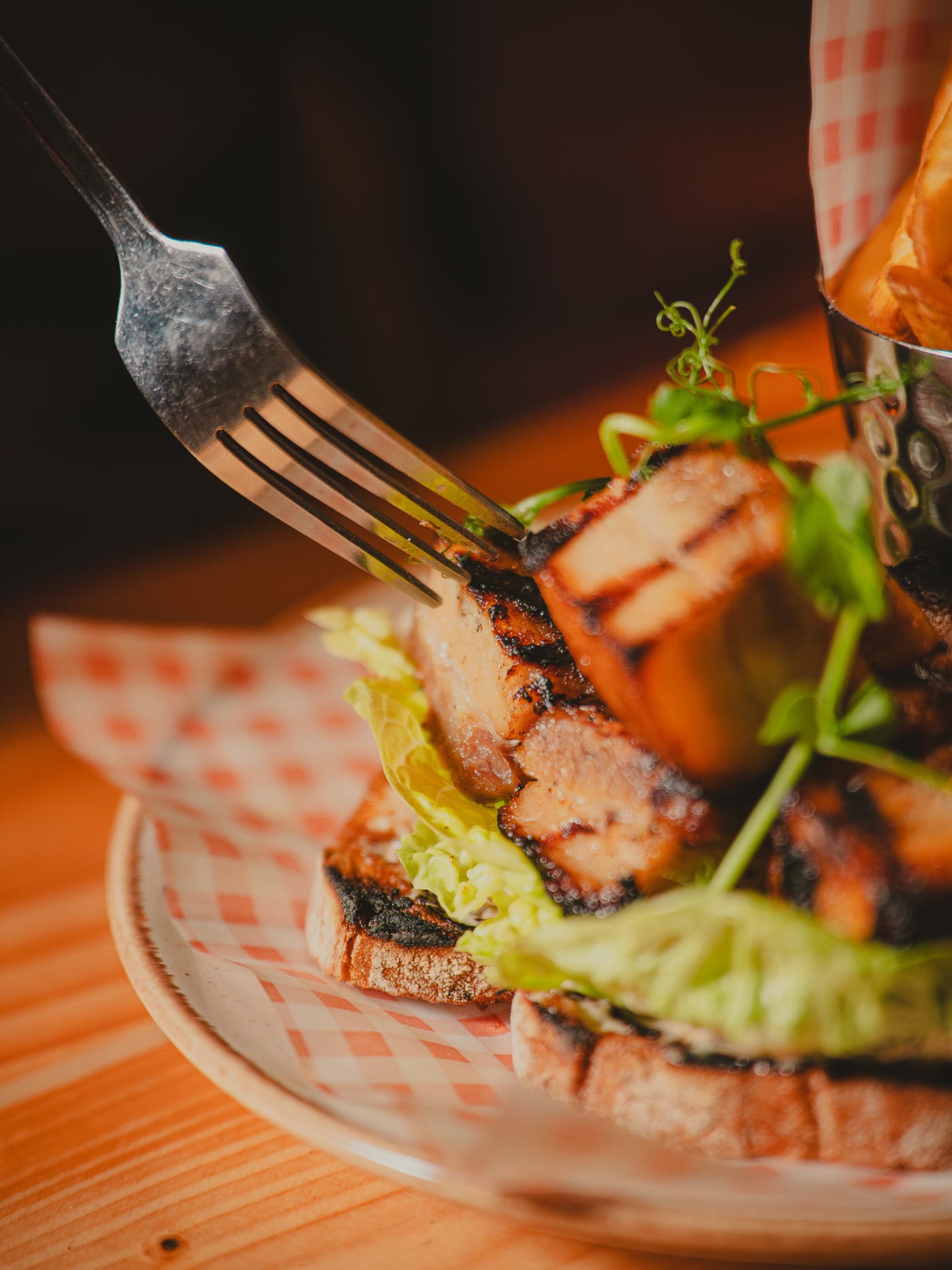 Pork belly open sandwich close-up at Newsroom