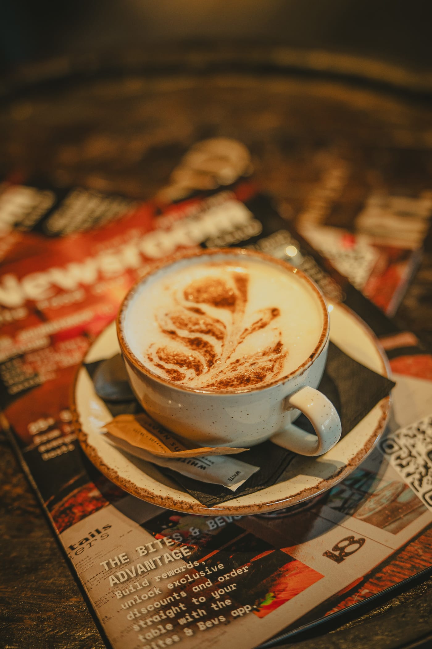 Latte art coffee served on the Newsroom newspaper menu