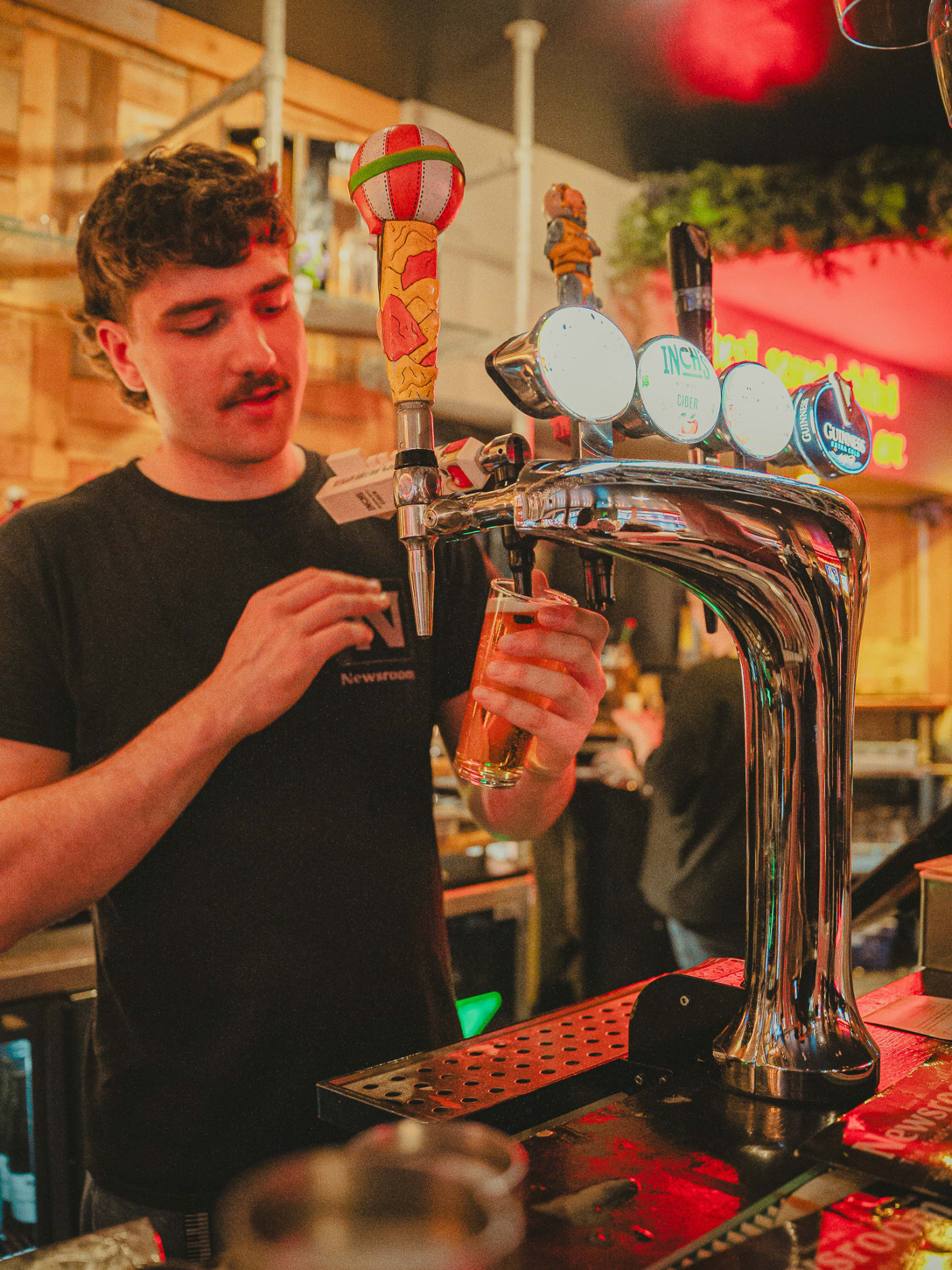 Fresh pint pulled at the taps at Newsroom