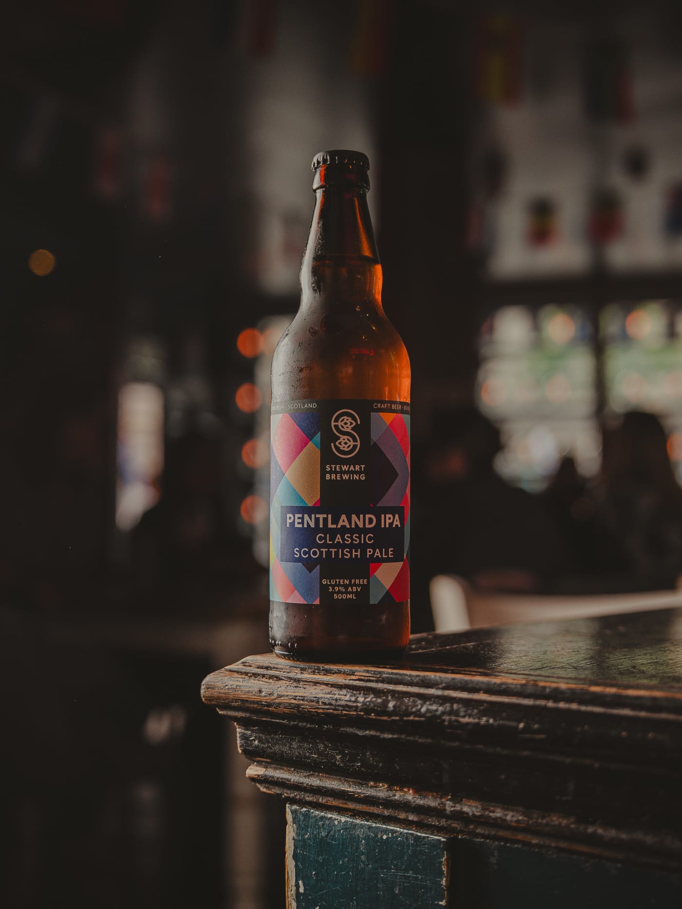 Bottle of Stewart Brewing Pentland IPA on the bar top at Newsroom, Edinburgh