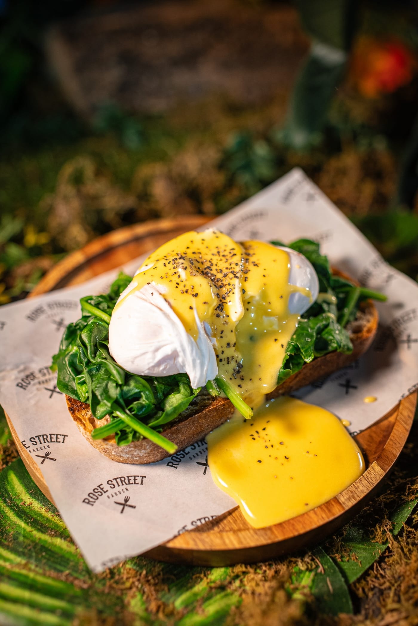 Eggs Florentine with hollandaise on the jungle set at Rose Street Garden, Edinburgh