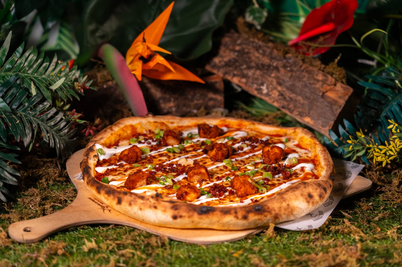 Wood-fired pizza with garlic drizzle at Rose Street Garden, Edinburgh