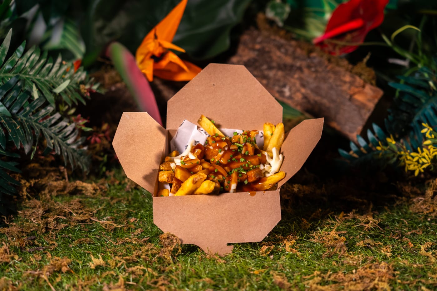 Loaded fries in a street food box at Rose Street Garden, Edinburgh