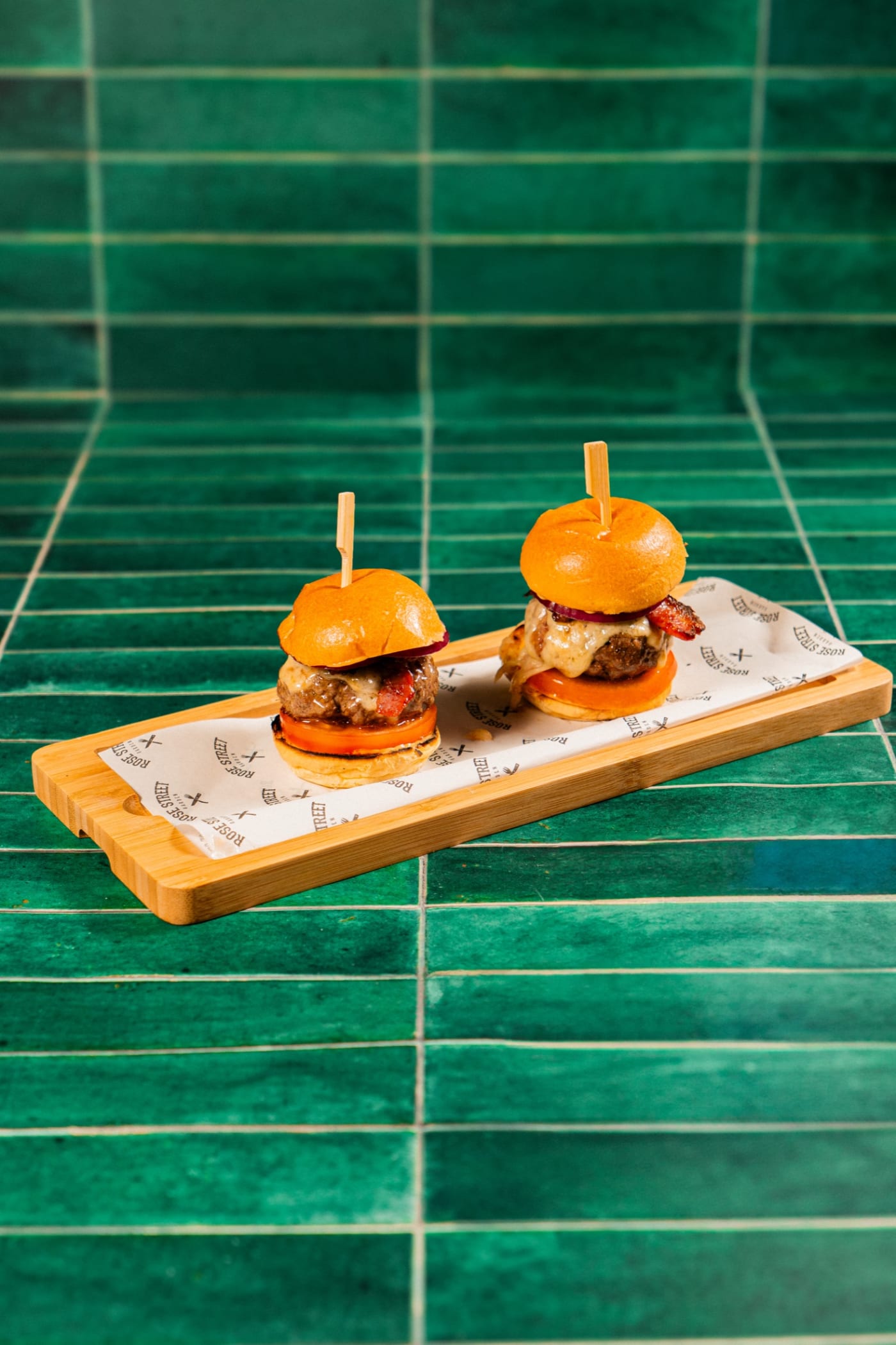 Mini burger sliders on the green tiles at Rose Street Garden, Edinburgh