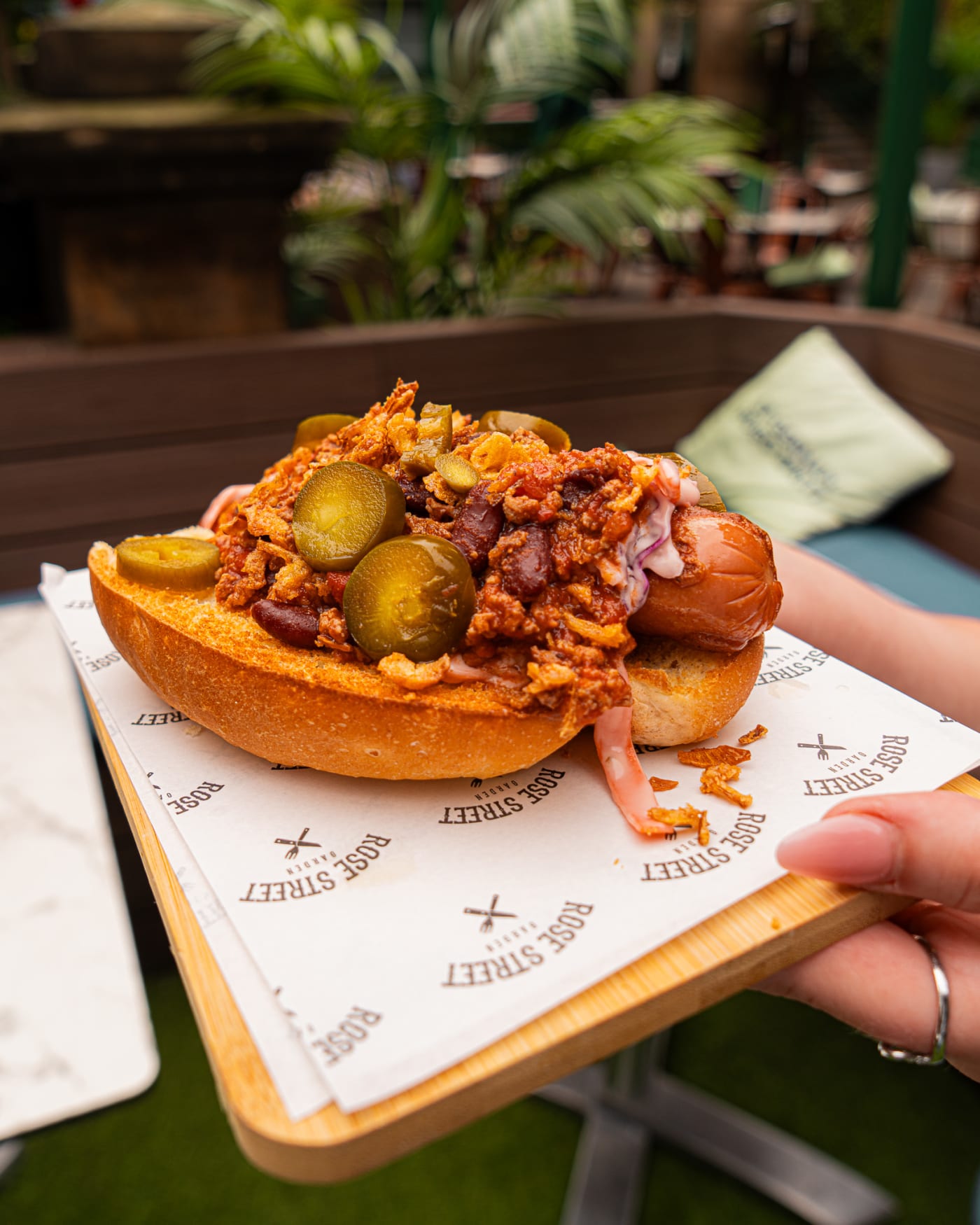 Loaded hot dog with jalapenos at Rose Street Garden, Edinburgh