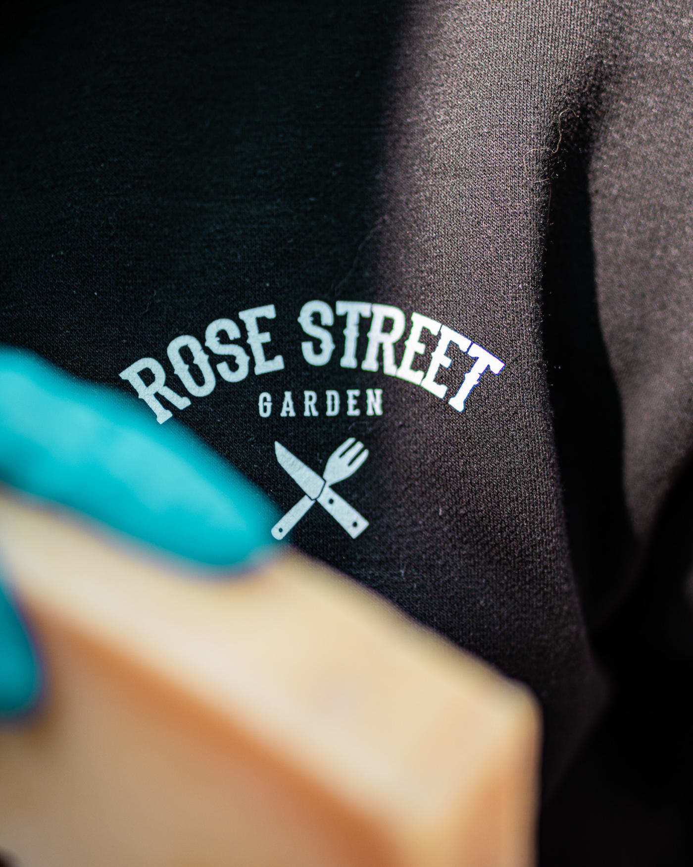 Rose Street Garden logo tee behind the bar at Rose Street Garden, Edinburgh