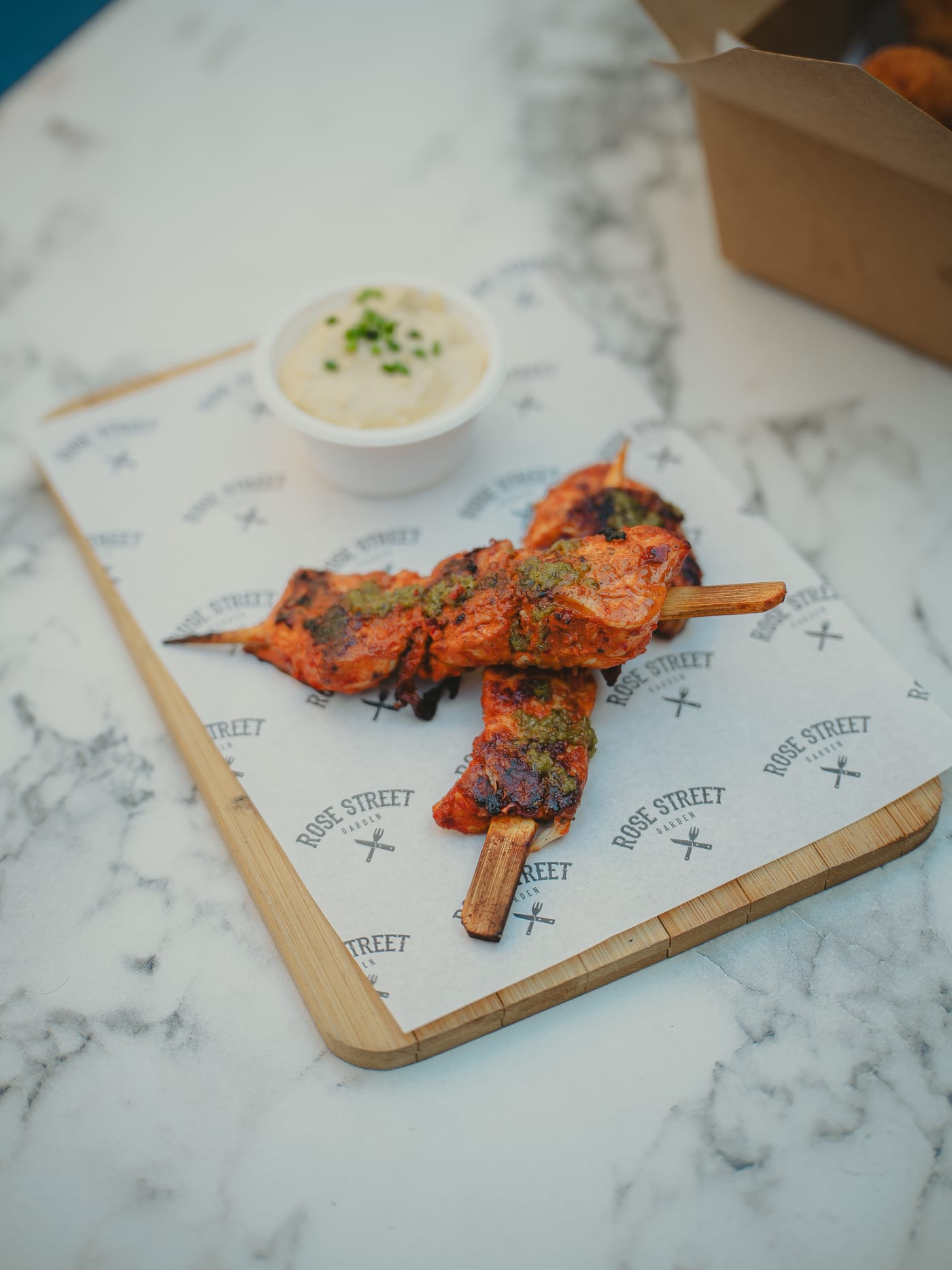 Chargrilled chicken skewers with dip at Rose Street Garden, Edinburgh