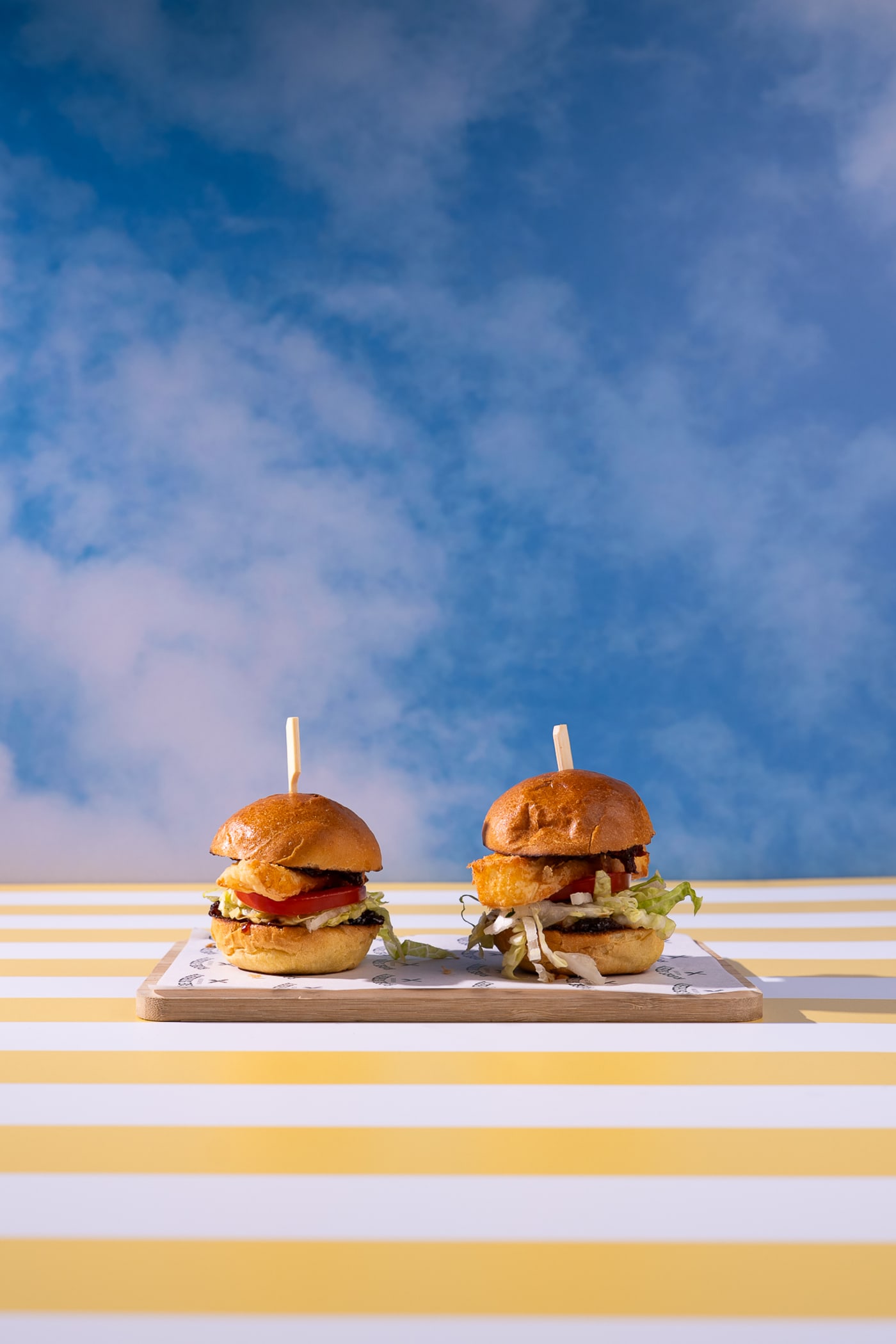Sliders on a board against the blue sky at Rose Street Garden, Edinburgh
