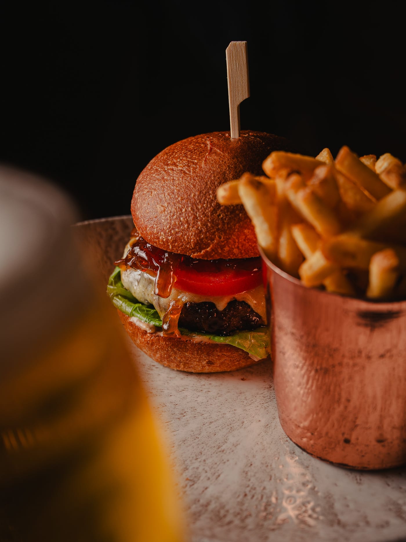 House burger with copper-cup fries at Ryan’s of Edinburgh
