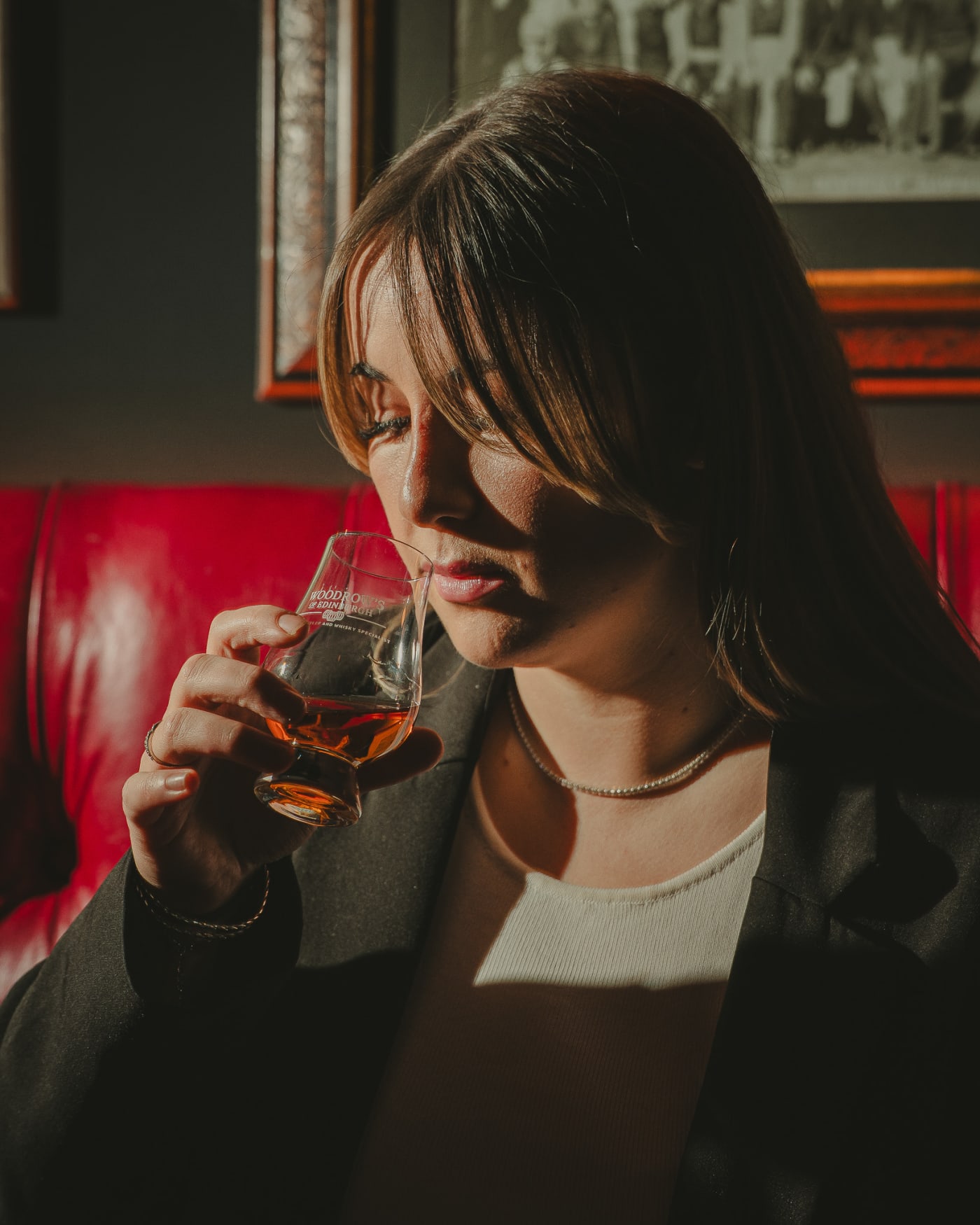 Guest nosing a dram of whisky on Burns Night at Ryan's of Edinburgh