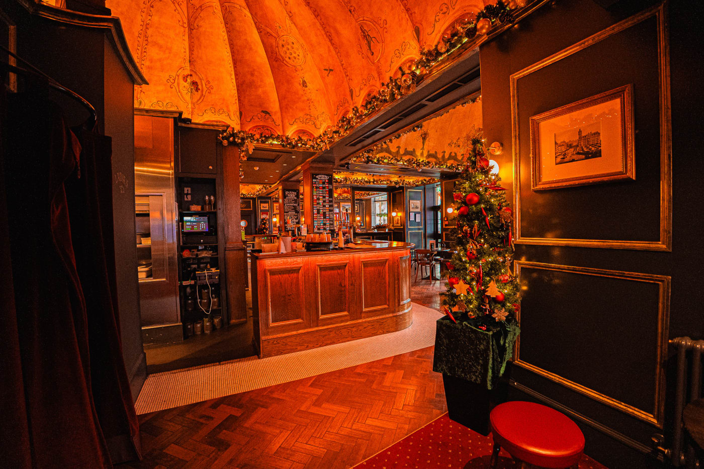 Christmas trees and festive decorations inside Ryan's of Edinburgh
