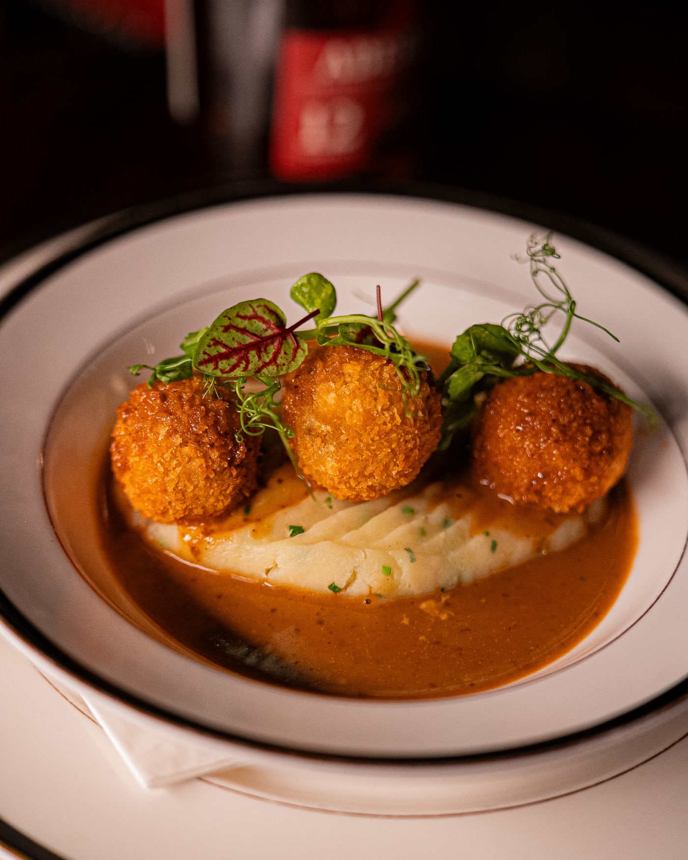 Haggis bonbons with a whisky sauce at The Bailie Bar