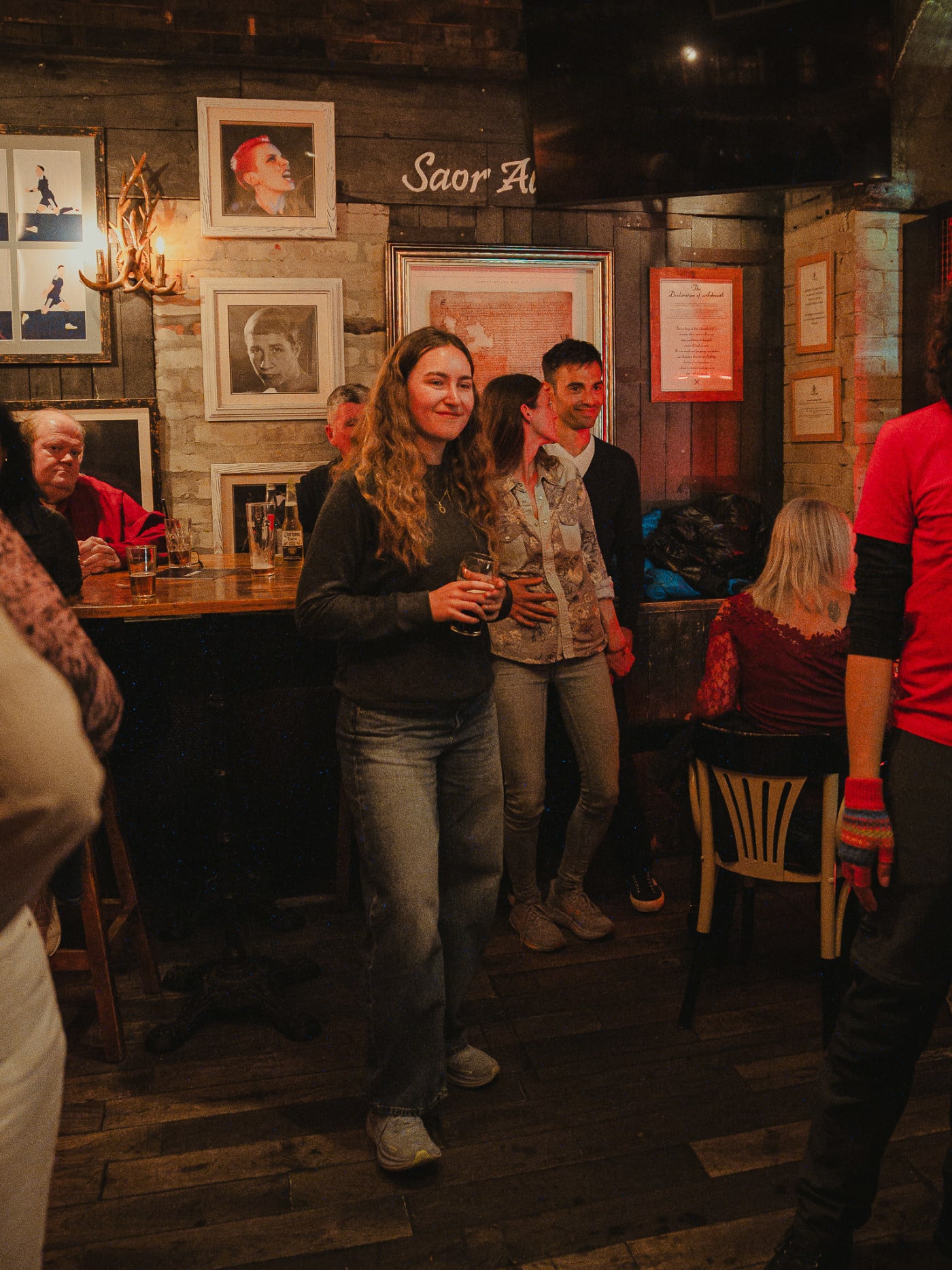 Guests at the bar at The Piper's Rest, Edinburgh