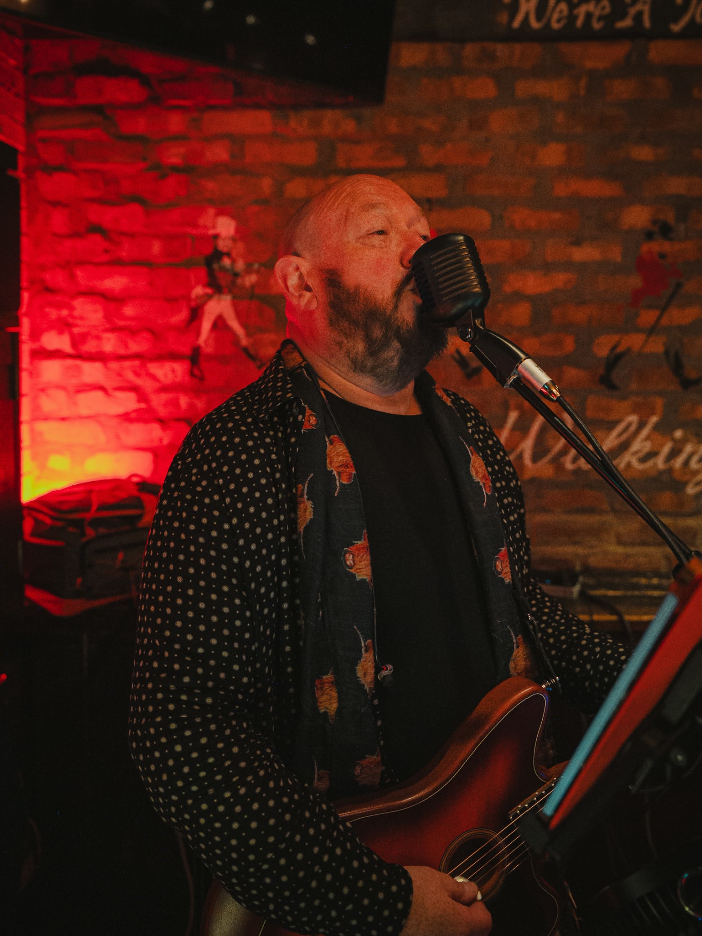 Live singer performing at The Piper's Rest, Edinburgh