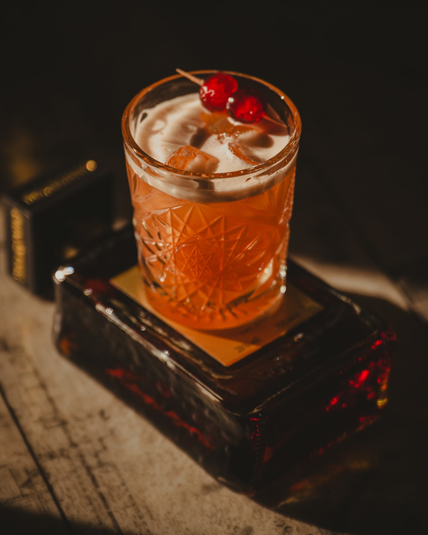 Disaronno old fashioned with cherries and the bottle at The Ship Inn