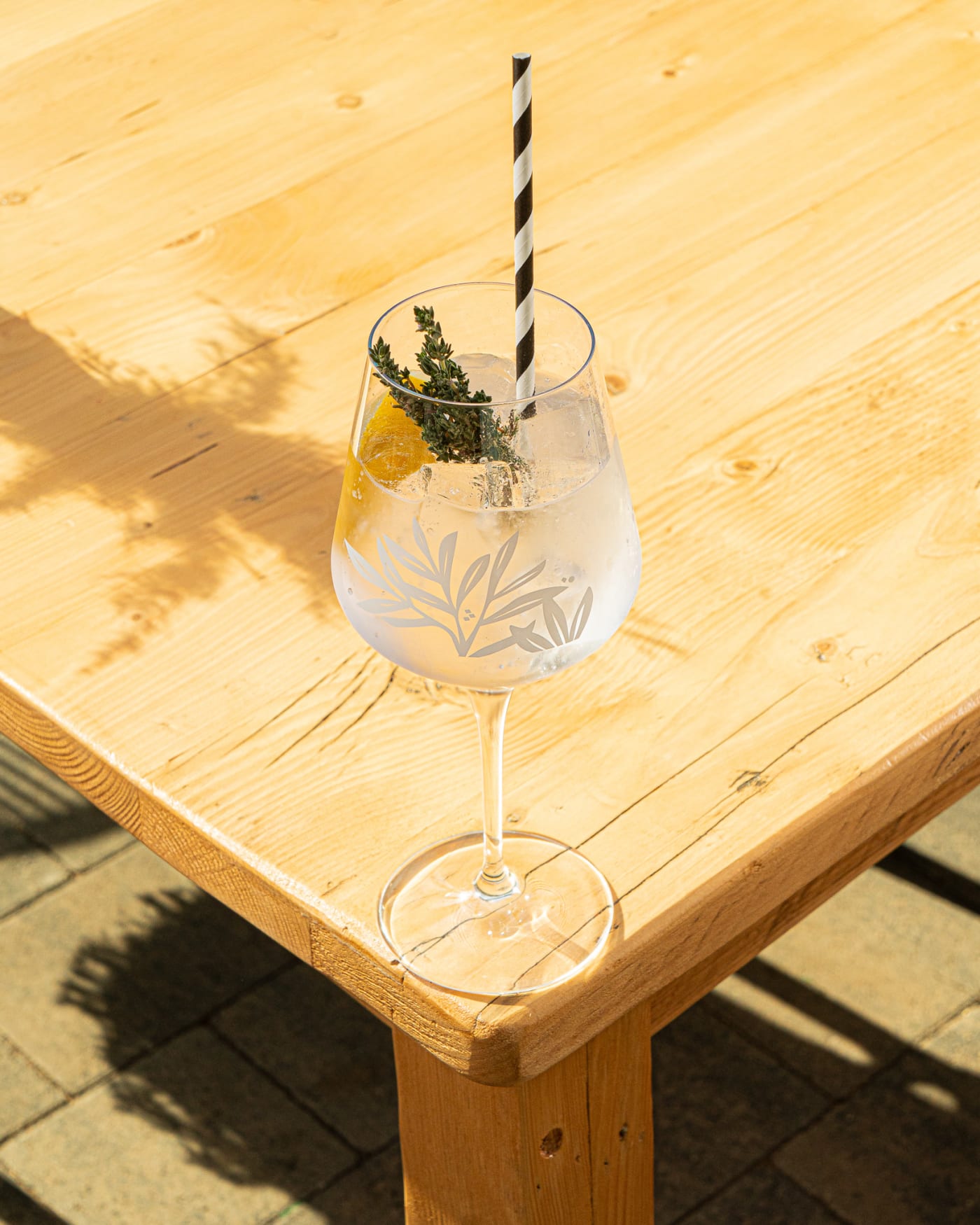 Cocktail with a sprig of thyme at The Ship Inn, Musselburgh