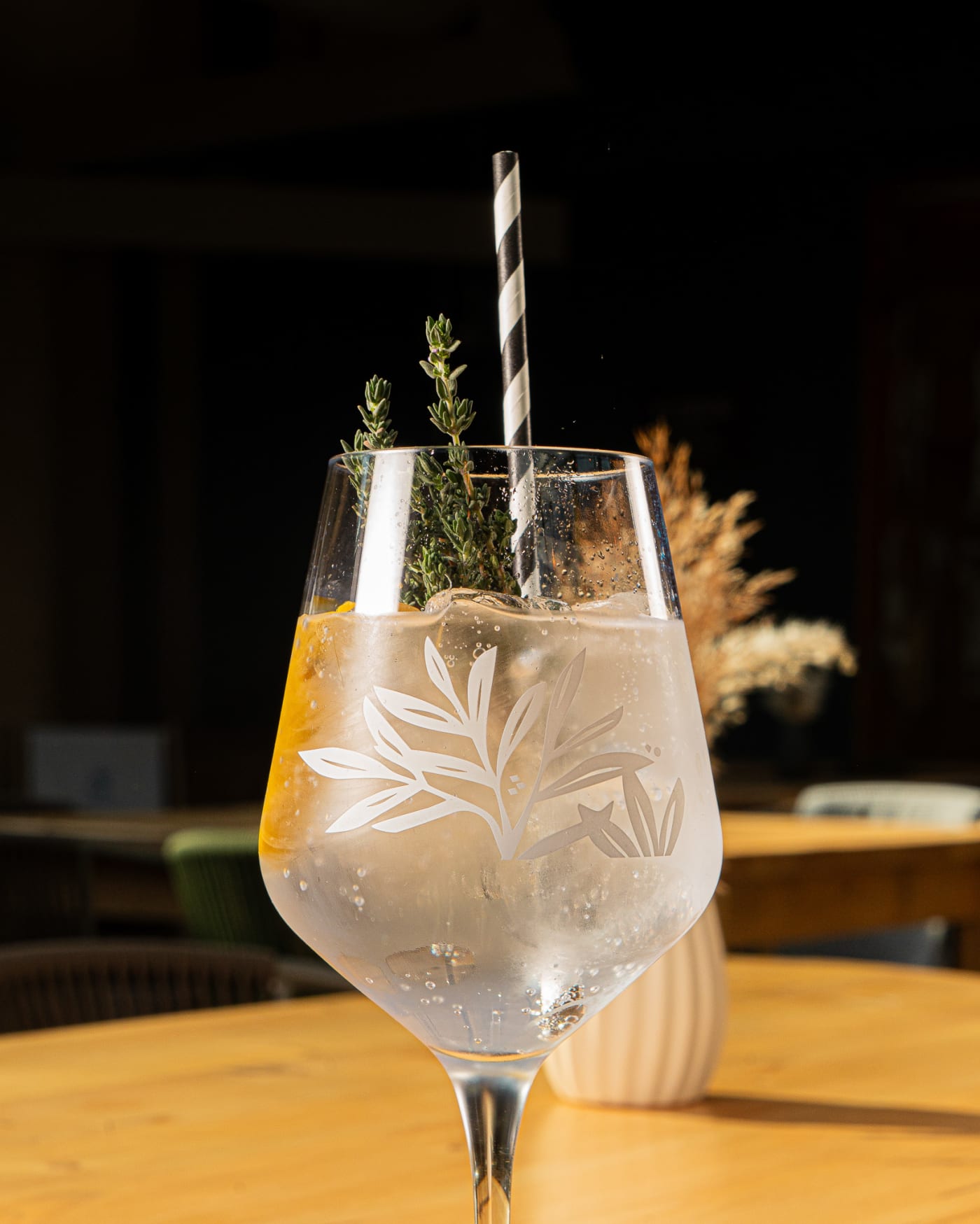 Gin cocktail with thyme in an etched glass at The Ship Inn