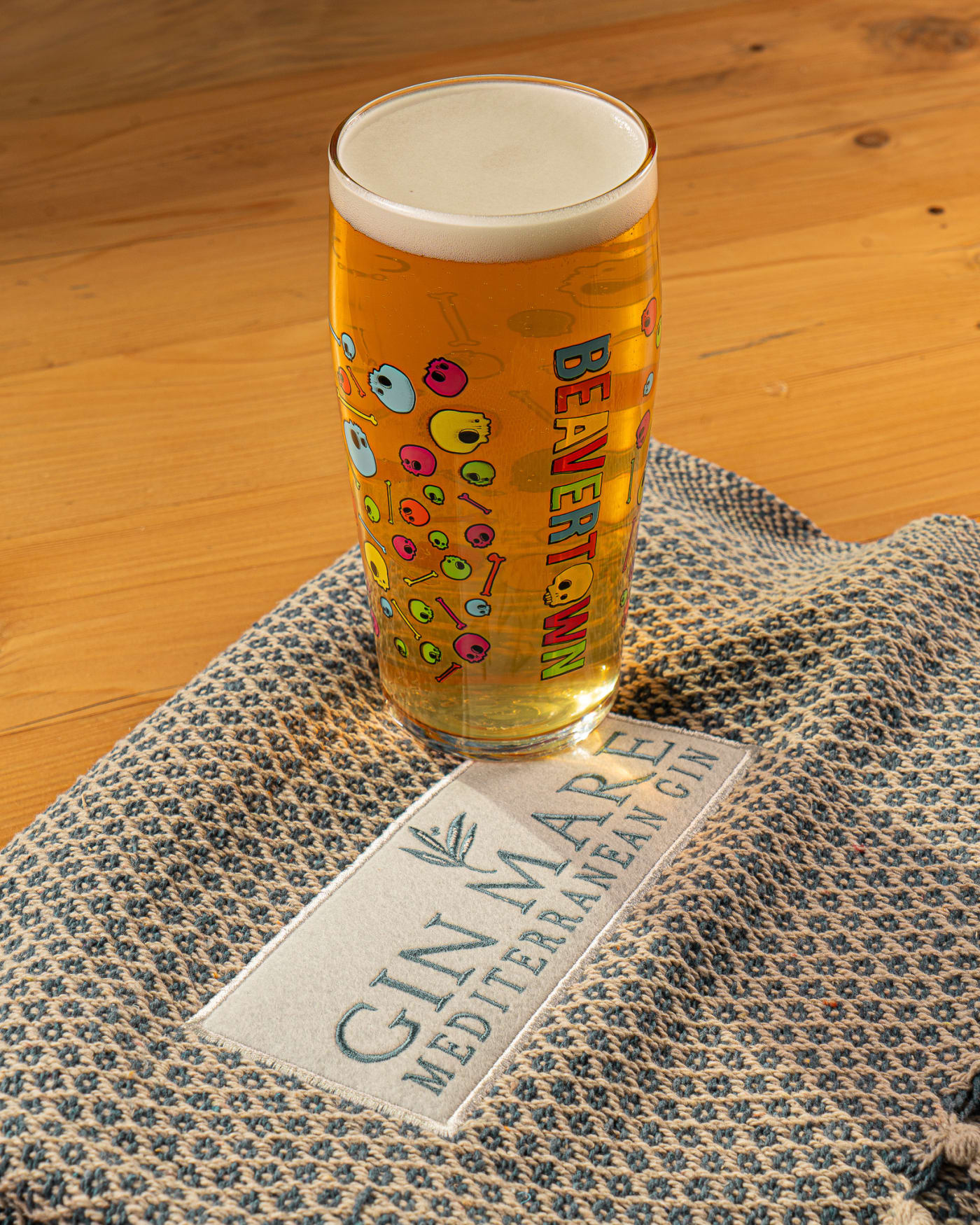 Pint of craft beer on a Gin Mare coaster at The Ship Inn
