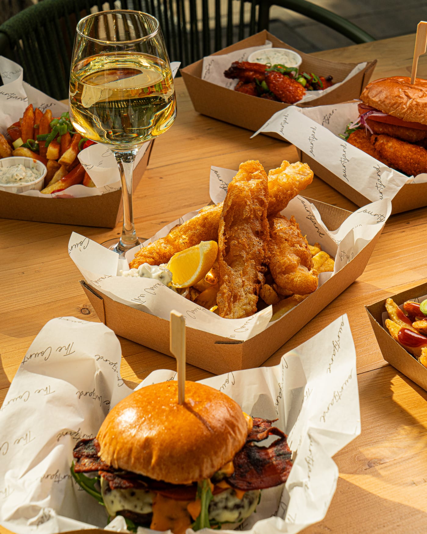 Fish goujons with a glass of white wine at The Ship Inn