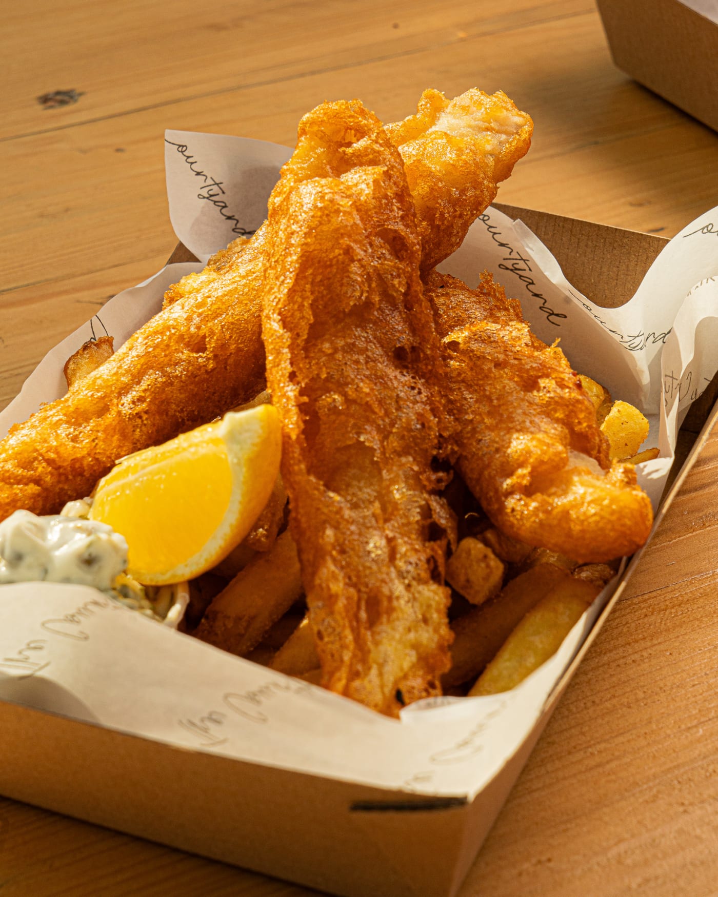 Fish and chips with a lemon wedge at The Ship Inn, Musselburgh
