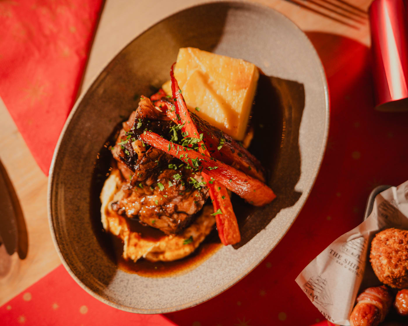 Christmas dinner spread with crackers at The Ship Inn, Musselburgh