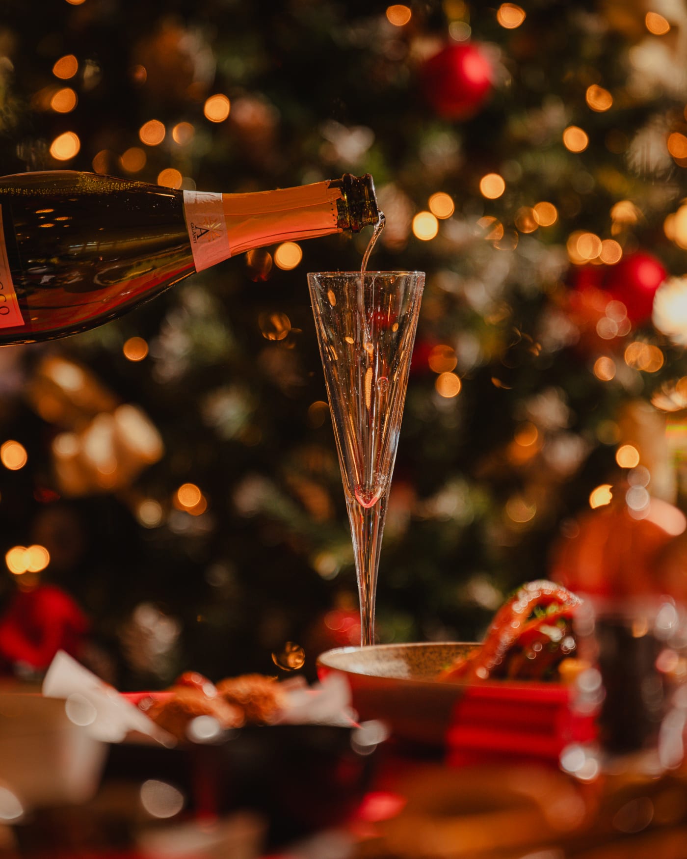 Champagne poured beside the Christmas tree at The Ship Inn