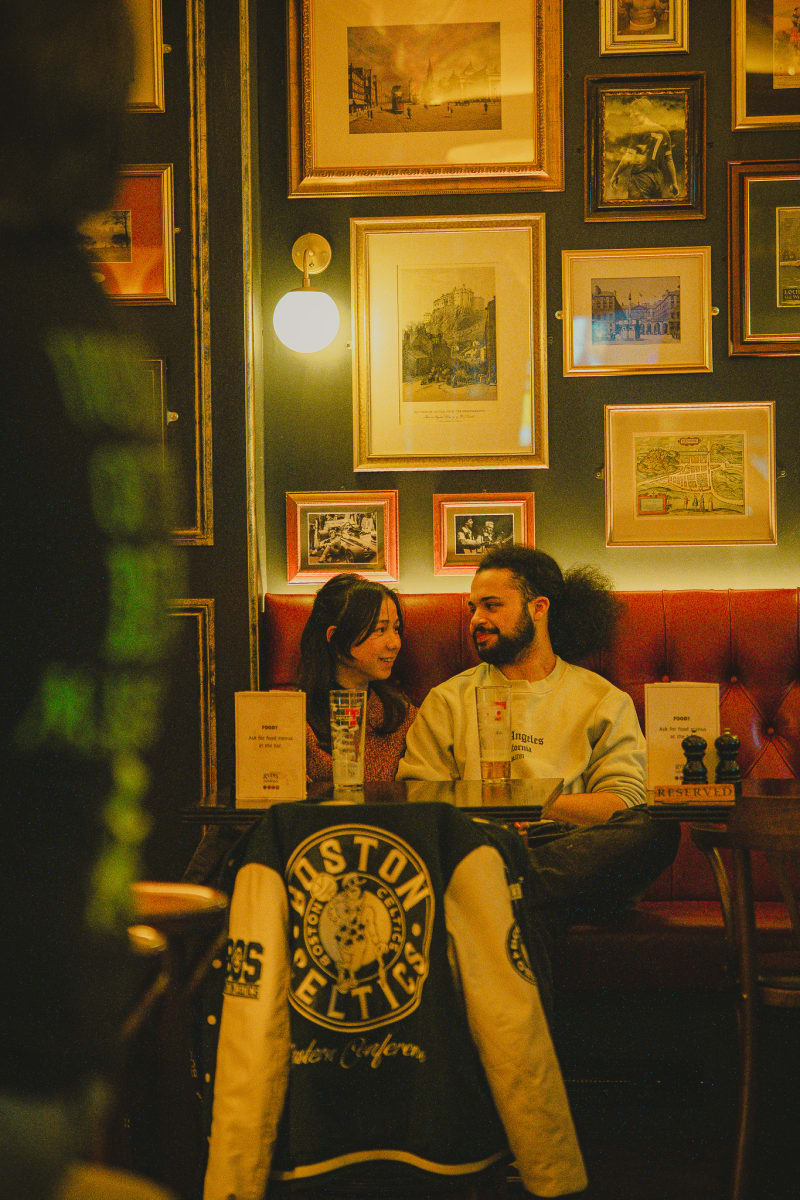 Guests under the picture wall at Ryan's of Edinburgh