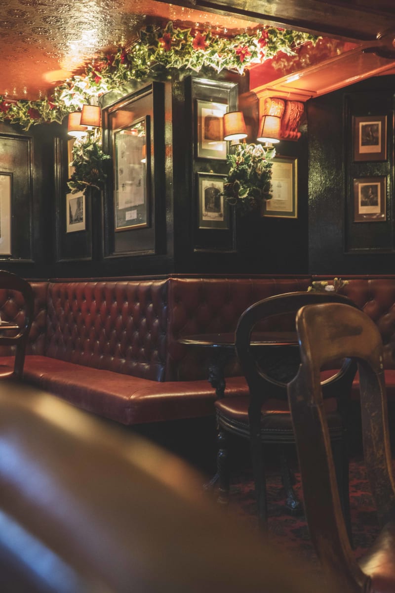Red leather booths at The Bailie Bar, Edinburgh