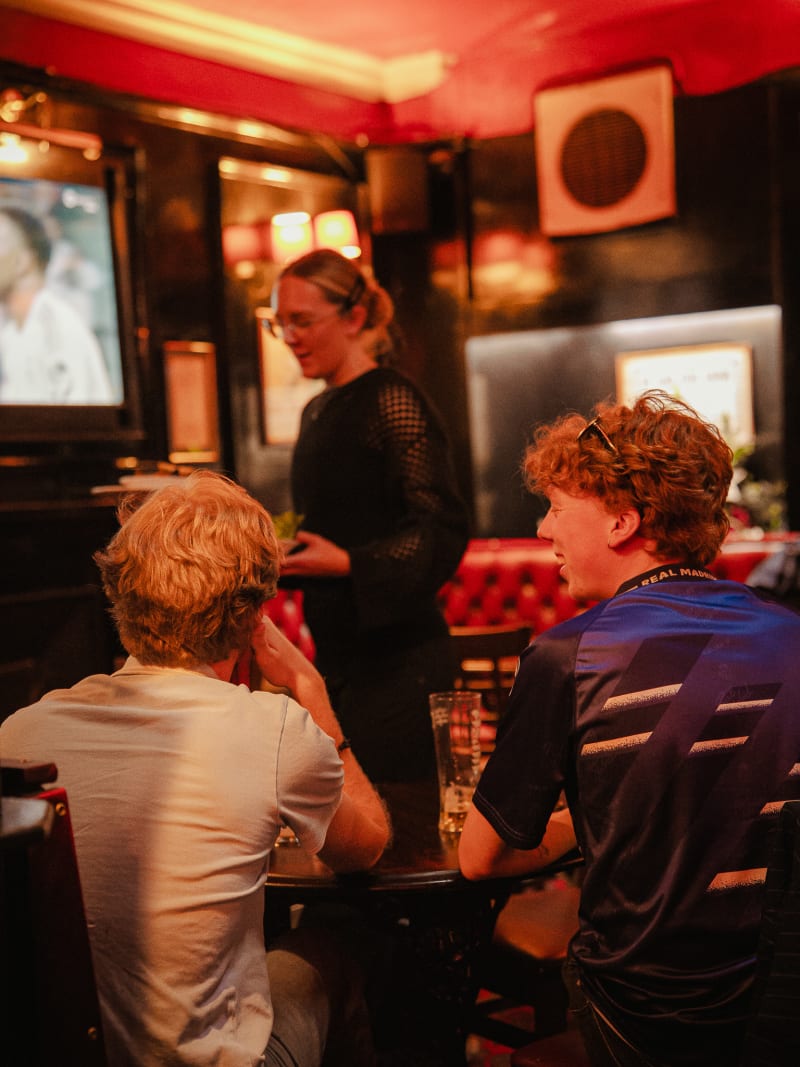 Guests at the bar at The Bailie Bar, Stockbridge