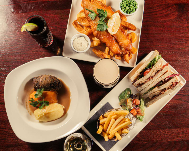 Overhead spread of sharing plates at Tiles Bar