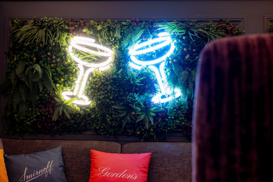 Neon cocktail glass sign at The Pear Tree