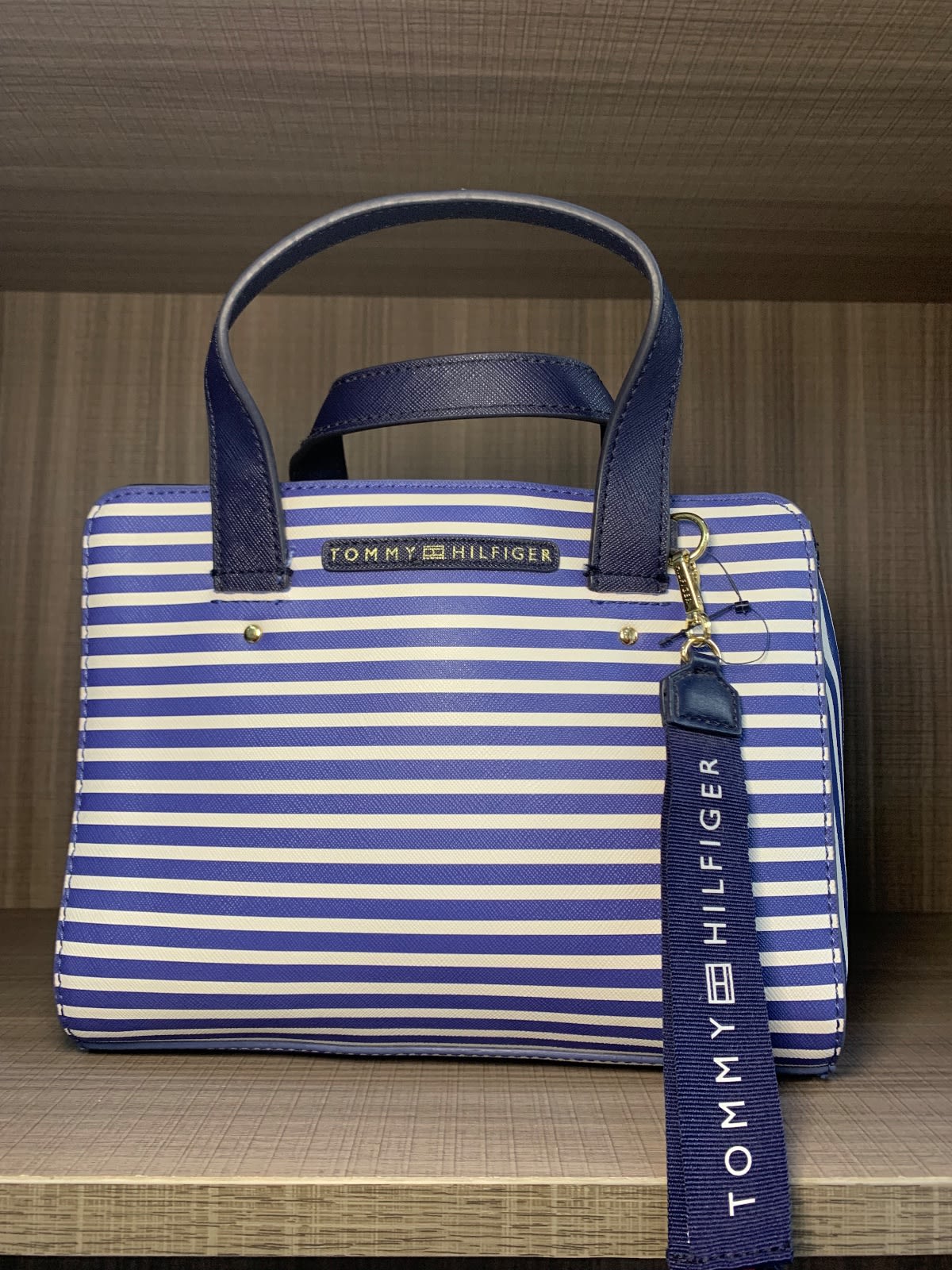 Tommy Hilfiger, photo 1 of 2