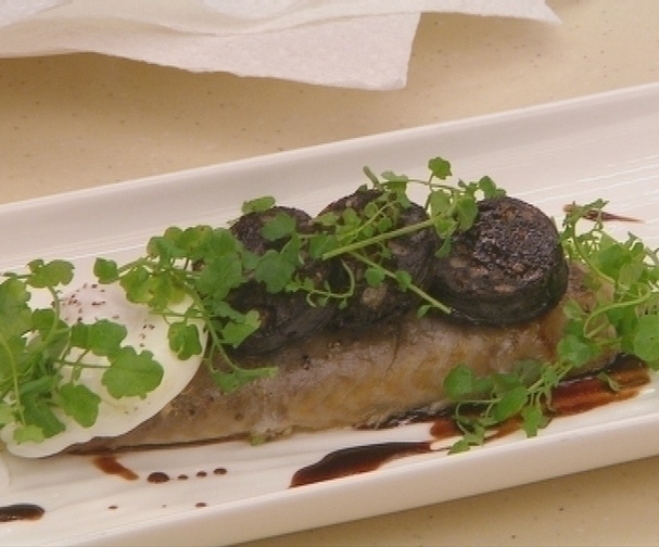 Smoked mackerel with black pudding, poached egg and port sauce Good