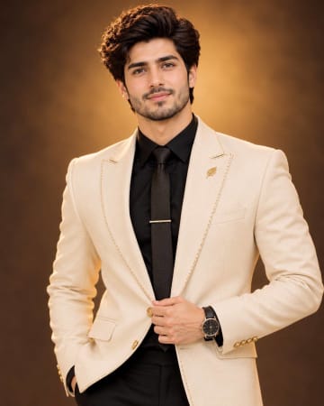 Handsome Man in Cream Blazer Golden Studio Portrait