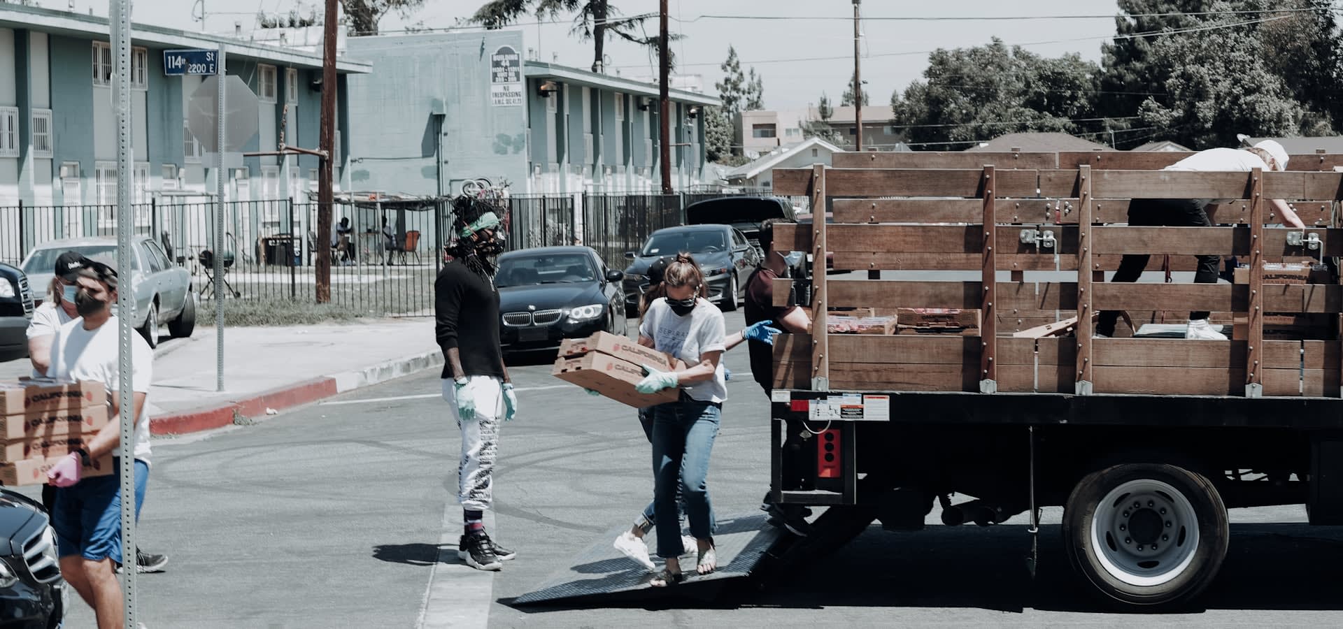 Volunteers loading supplies at a community drive