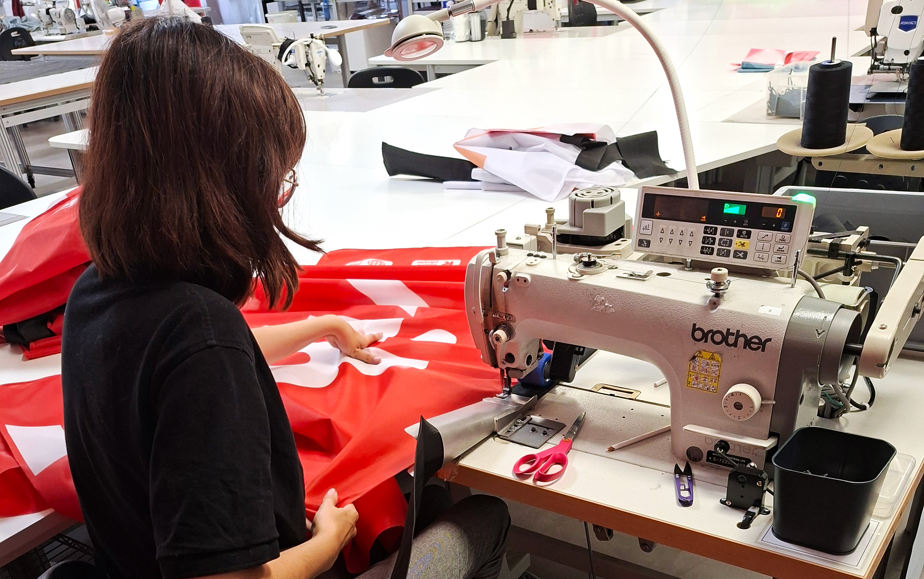 In-house sewing and finishing of printed graphics