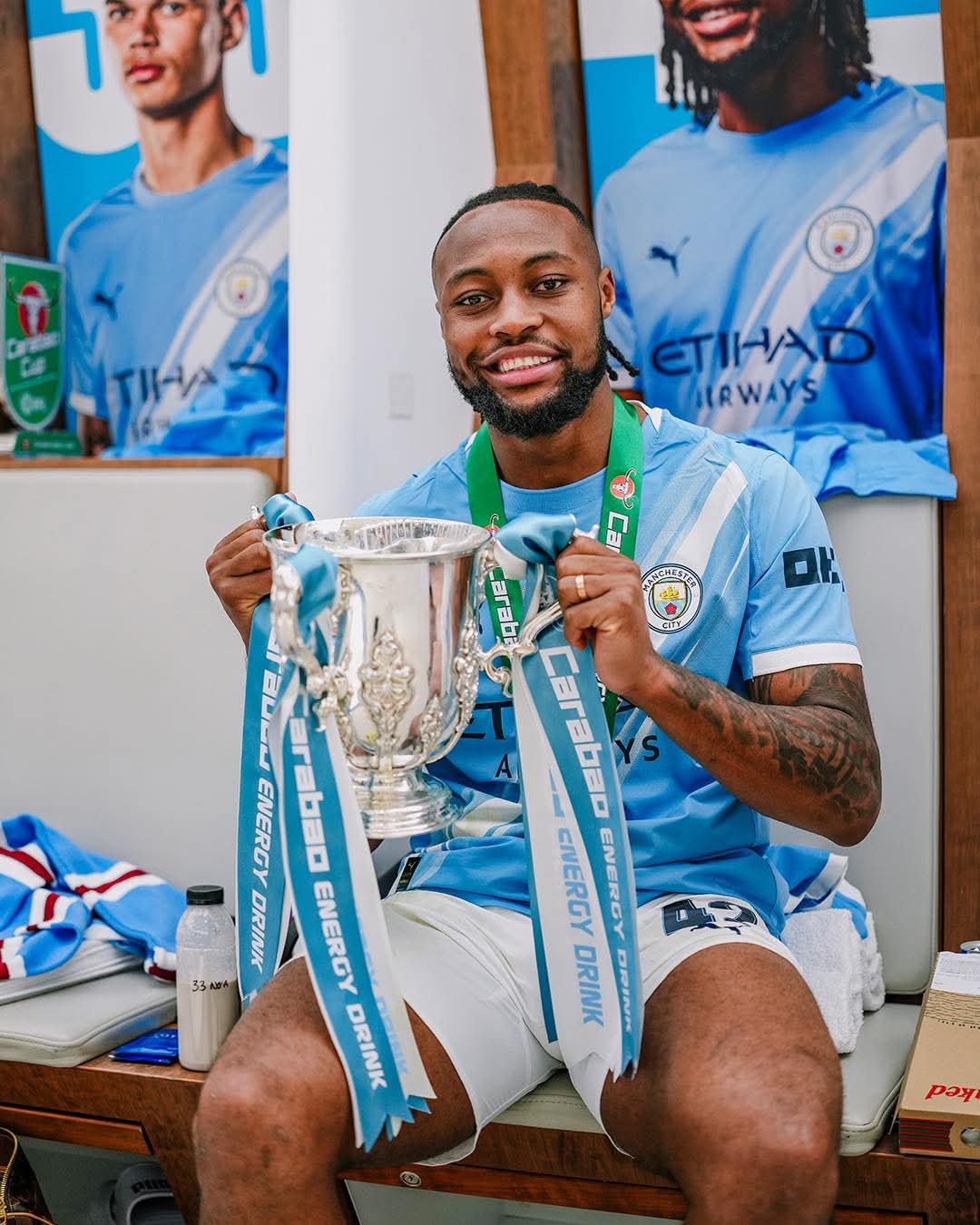 Semenyo holding the FA Cup Trophy