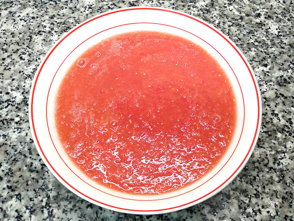 Tomate rallado.