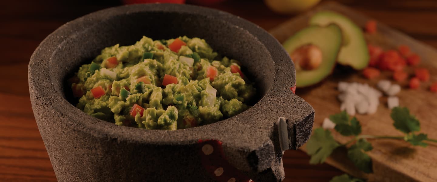 fresh guacamole with pico de gallo