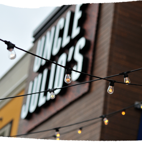 string lights hung outside of Uncle Julio's on the patio
