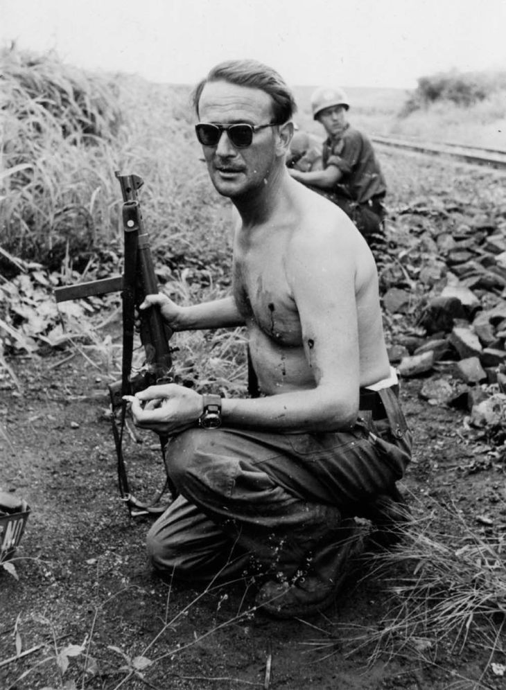 Major Erik Bonde smokes a cigarette