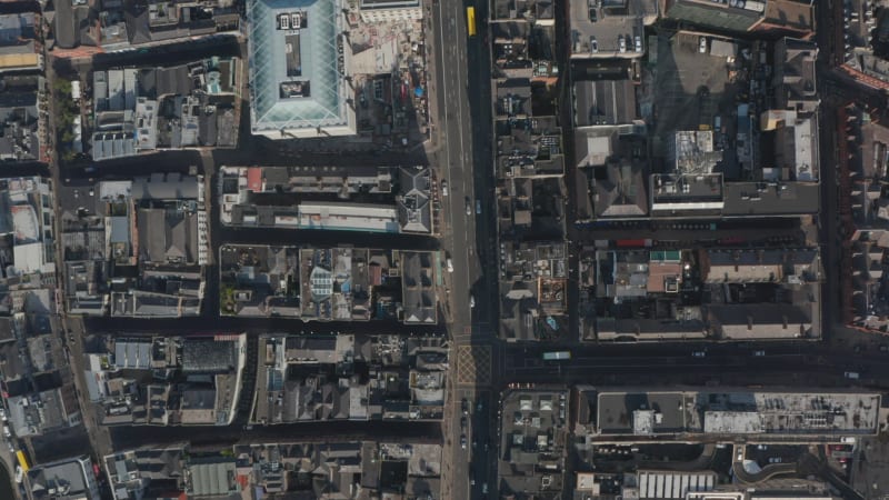 Aerial birds eye overhead top down panning view of streets in city at Houses of Parliament. Dublin, Ireland