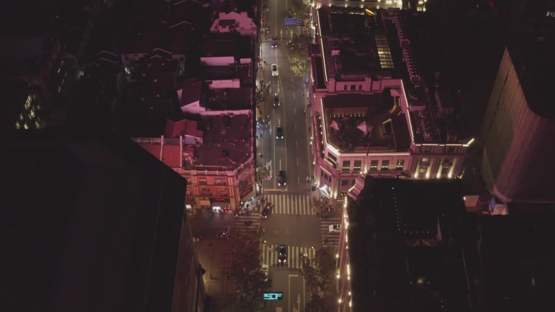 Aerial view of Shanghai streets at night with lights, China.