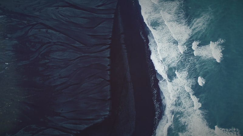 Aerial view of black sand on Diamond Beach in Iceland.