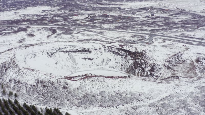 Snowy Volcanic Kerid Crater on the Golden Circle of Iceland Seen From the Air