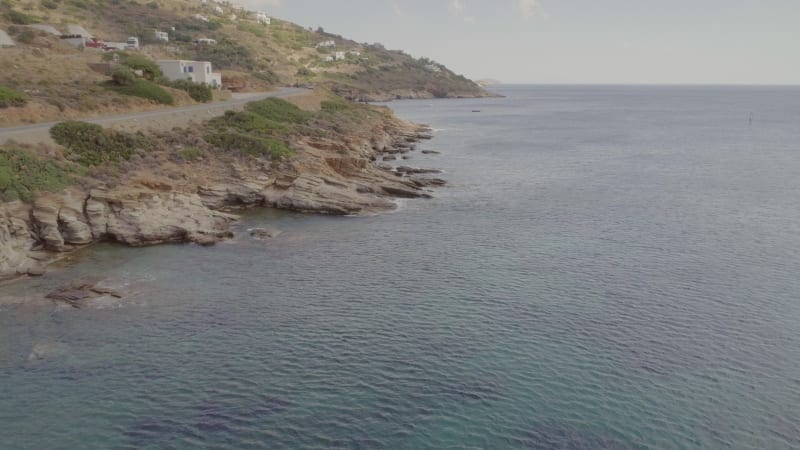 Aerial view of a man on a stand up paddle board in the sea