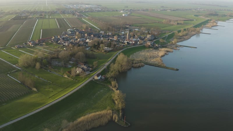 Small Town Jaarsveld At Riverside Surrounded By Fields