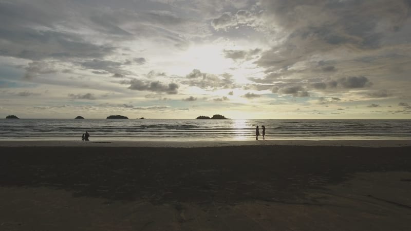 Aerial view of people at beach observing a sunset, Ko Chang.