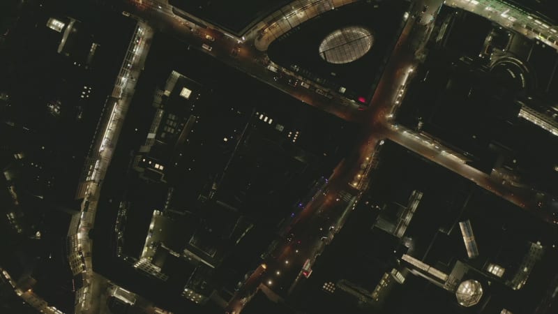 AERIAL: Wide Shot of Cologne Germany from the air with majestic Cathedral at Night