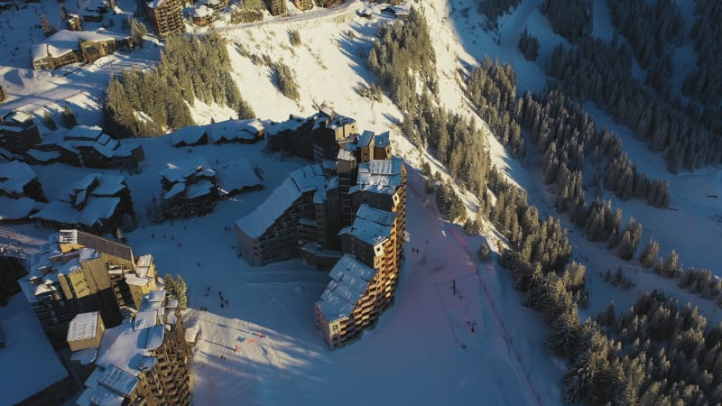 Aerial view of residential buildings on mountain crest, Avoriaz, France.